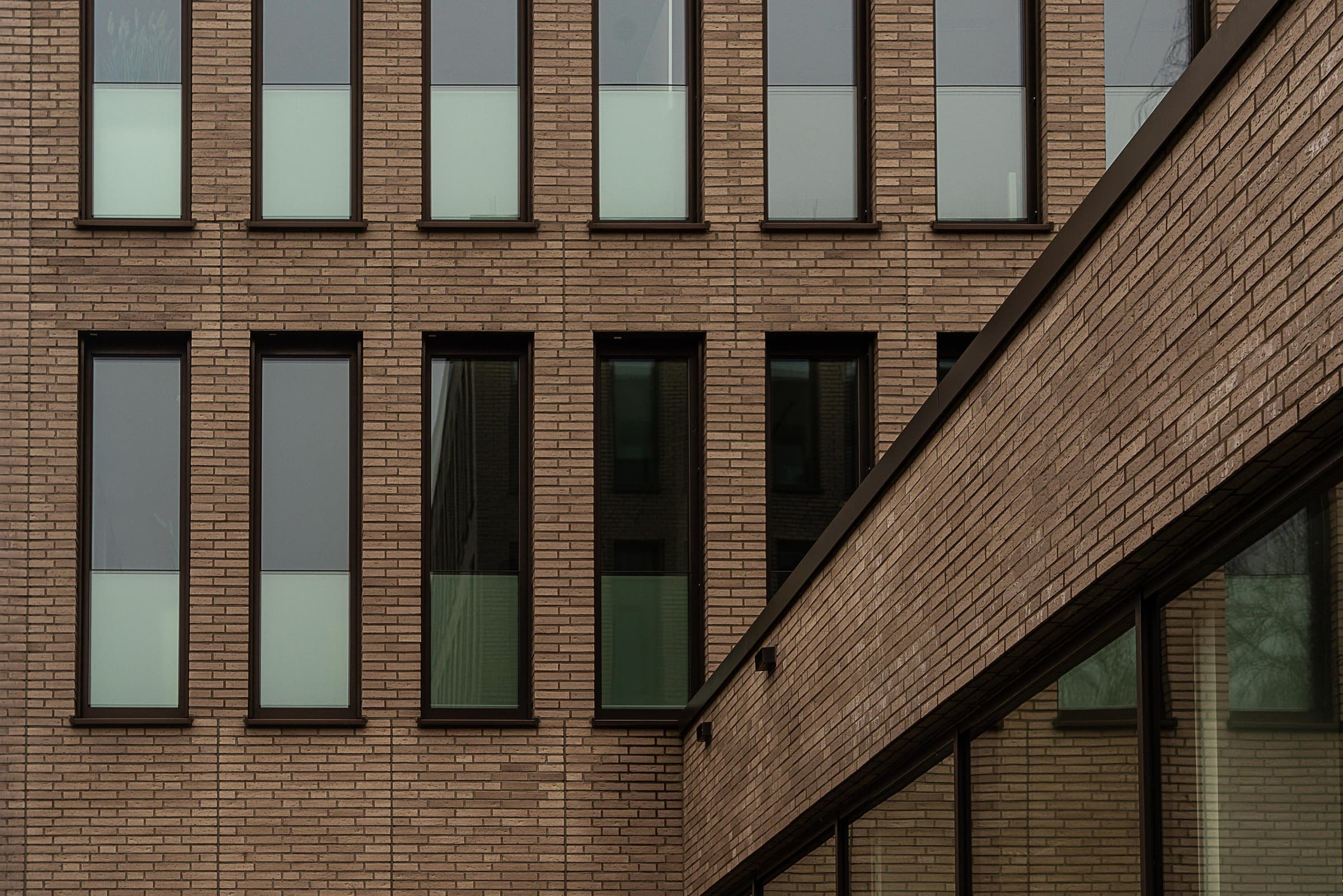 Brick office facade with tall windows